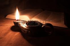16757394-oil-lamp-and-bible.jpg